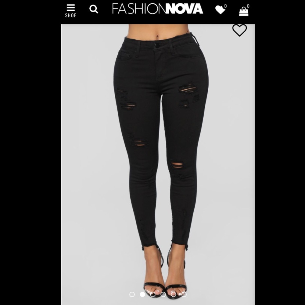 Distressed black skinny jeans